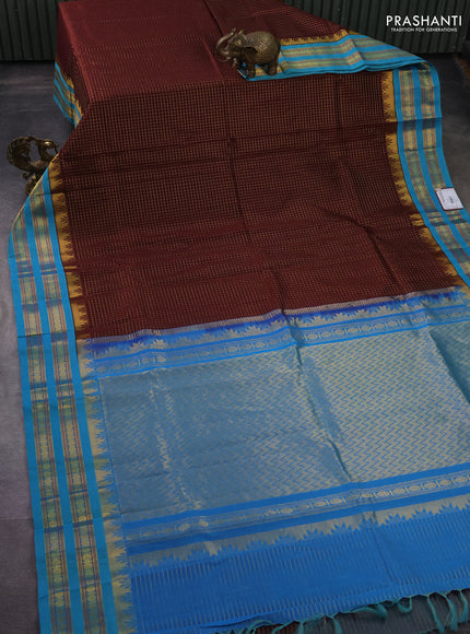 Silk cotton saree deep maroon and teal blue with allover small zari checked pattern and temple design zari woven korvai border