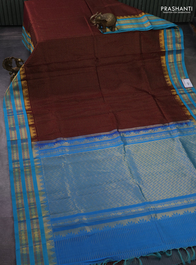 Silk cotton saree deep maroon and teal blue with allover small zari checked pattern and temple design zari woven korvai border