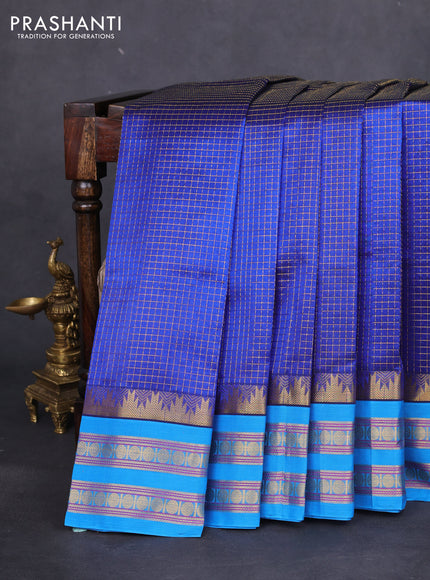 Silk cotton saree blue and cs blue with allover small zari checked pattern and temple design zari woven korvai border