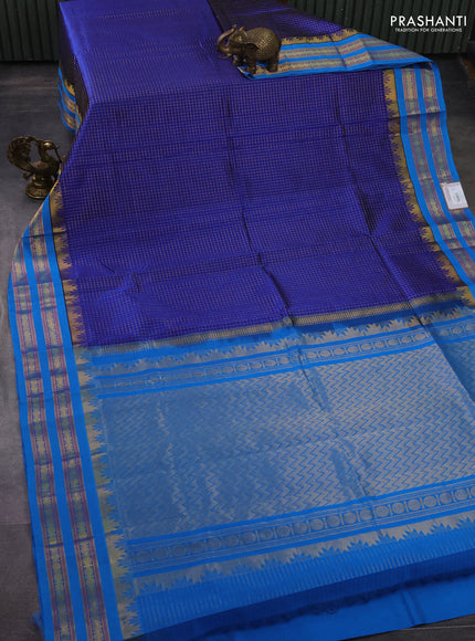 Silk cotton saree blue and cs blue with allover small zari checked pattern and temple design zari woven korvai border