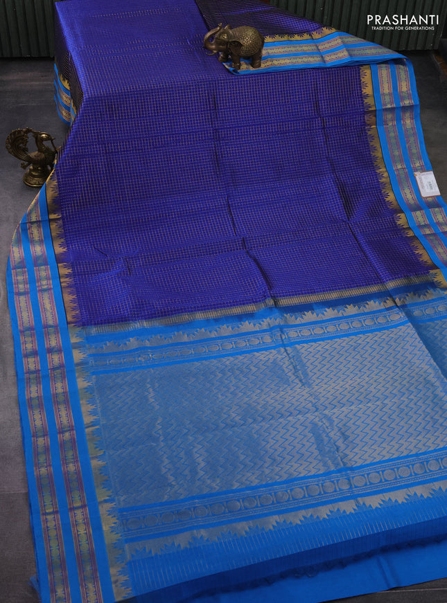 Silk cotton saree blue and cs blue with allover small zari checked pattern and temple design zari woven korvai border