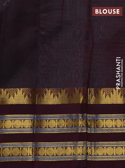 Silk cotton saree teal blue and deep maroon with allover small zari checked pattern and temple design zari woven korvai border