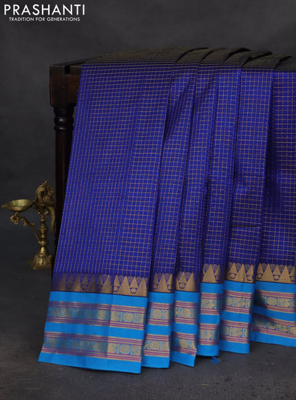 Silk cotton saree blue and cs blue with allover small zari checked pattern and temple design zari woven korvai border