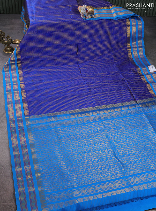 Silk cotton saree blue and cs blue with allover small zari checked pattern and temple design zari woven korvai border