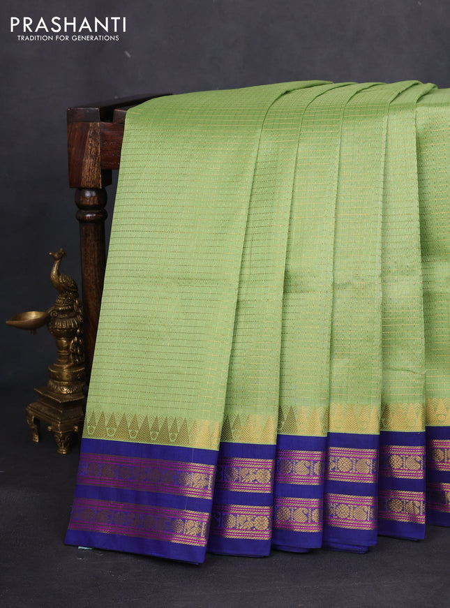 Silk cotton saree pista green and blue with allover small zari checked pattern and temple design zari woven korvai border