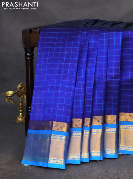 Silk cotton saree blue and cs blue with allover thread woven checked pattern and zari woven korvai border