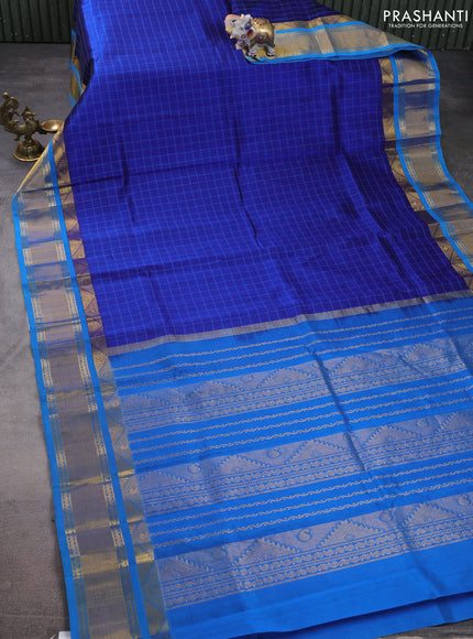 Silk cotton saree blue and cs blue with allover thread woven checked pattern and zari woven korvai border