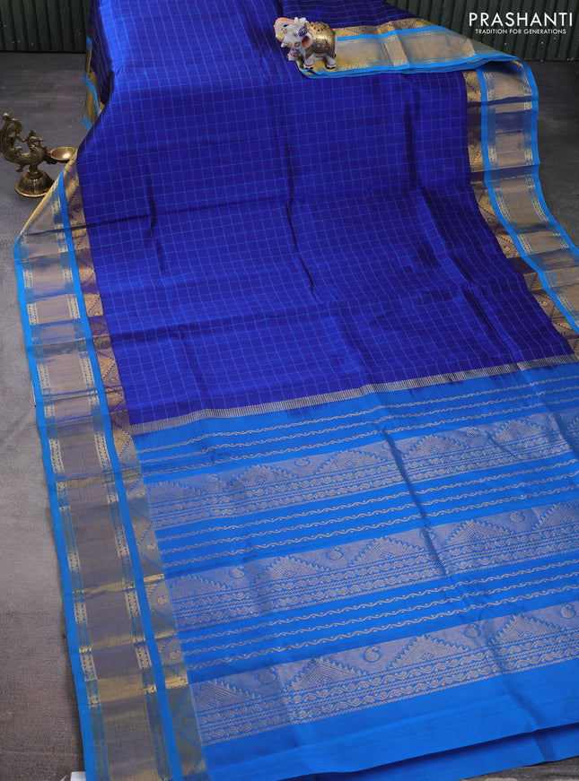 Silk cotton saree blue and cs blue with allover thread woven checked pattern and zari woven korvai border