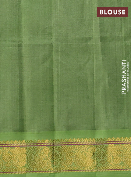 Silk cotton saree violet and light green with plain body and zari woven korvai border