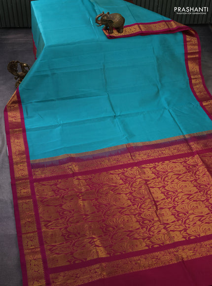 Silk cotton saree teal blue and magenta pink with allover vairaosi pattern and zari woven korvai border