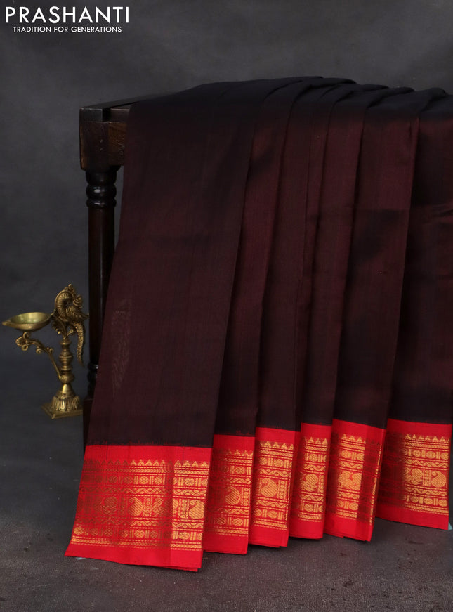 Silk cotton saree deep maroon and red with plain body and zari woven korvai border
