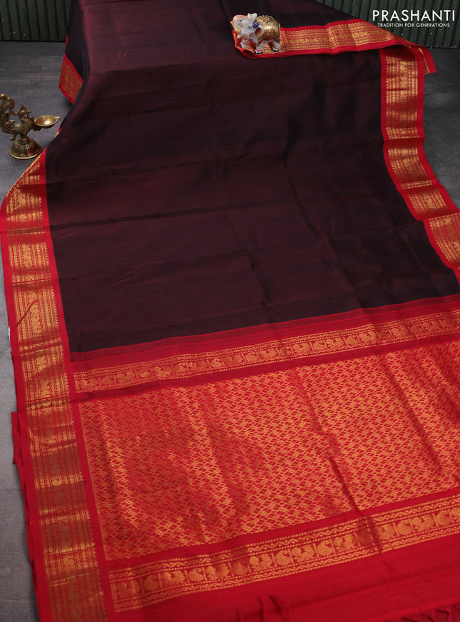 Silk cotton saree deep maroon and red with plain body and zari woven korvai border