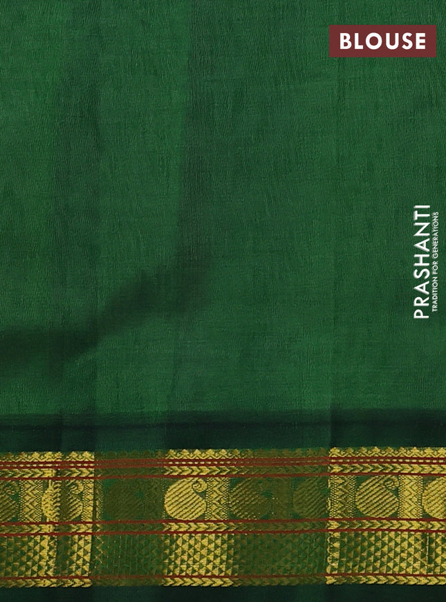 Silk cotton saree grey and green with plain body and zari woven korvai border