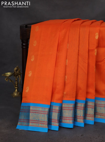 Silk cotton saree orange and cs blue with zari woven buttas and zari woven korvai border