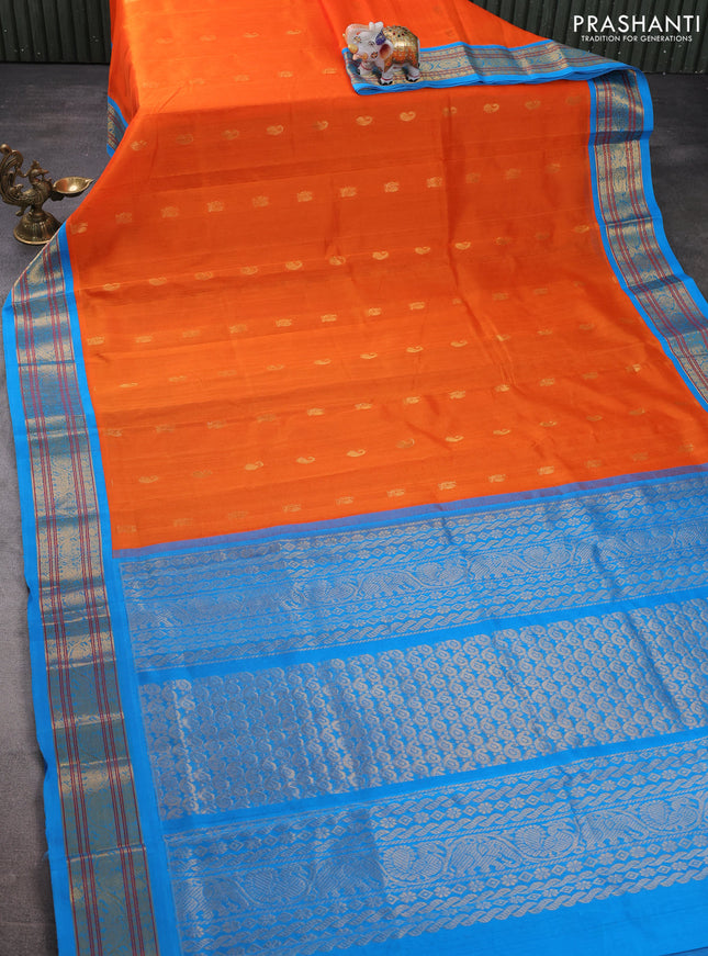Silk cotton saree orange and cs blue with zari woven buttas and zari woven korvai border
