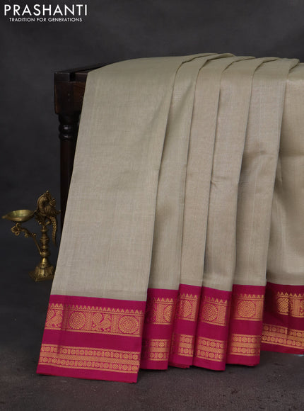 Silk cotton saree beige and magenta pink with plain body and rettapet zari woven korvai border
