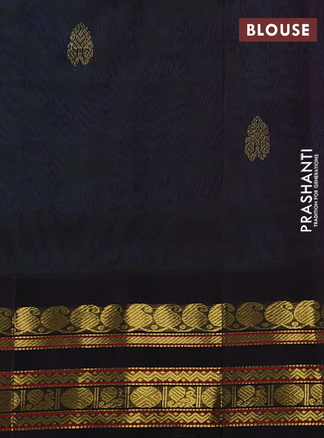 Silk cotton saree dual shade of teal bluish green and coffee brown with zari woven buttas and zari woven korvai border