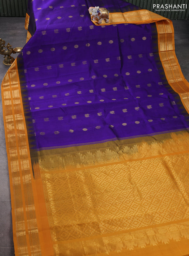 Silk cotton saree blue and mustard yellow with annam & rushraksha zari woven buttas and temple design zari woven korvai border