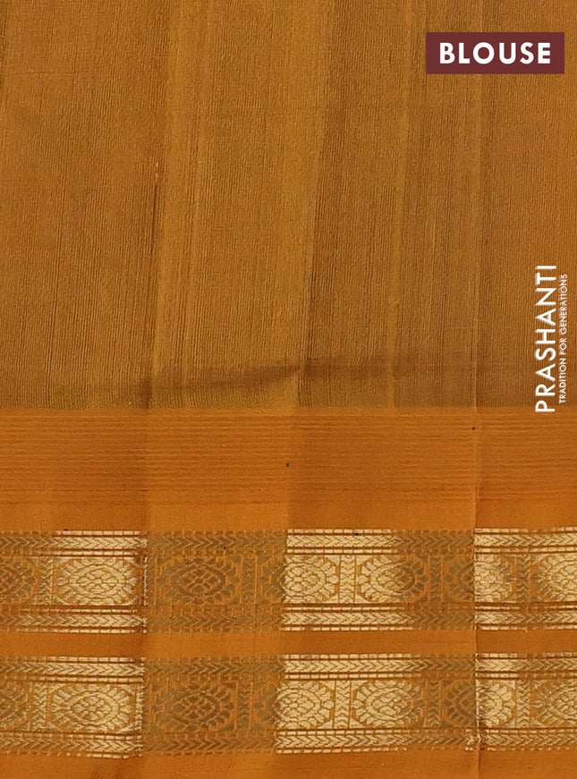 Silk cotton saree blue and mustard yellow with annam & rushraksha zari woven buttas and temple design zari woven korvai border