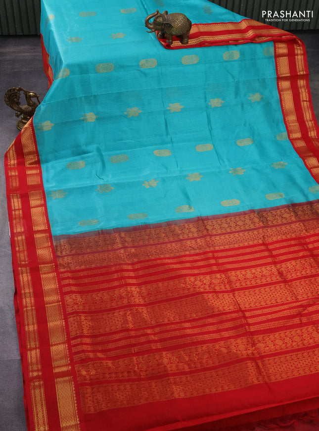 Silk cotton saree teal blue and red with zari woven buttas and zari woven korvai border