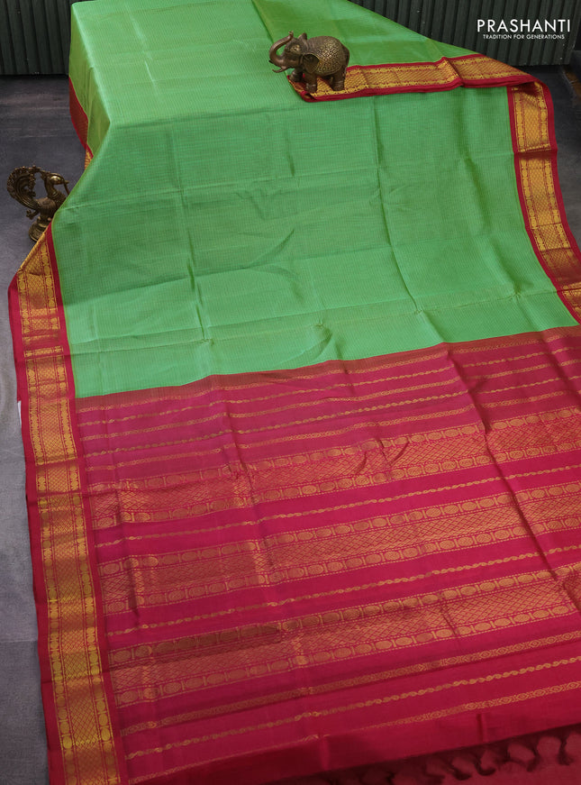 Silk cotton saree green and pink with allover thread checked pattern and zari woven korvai border