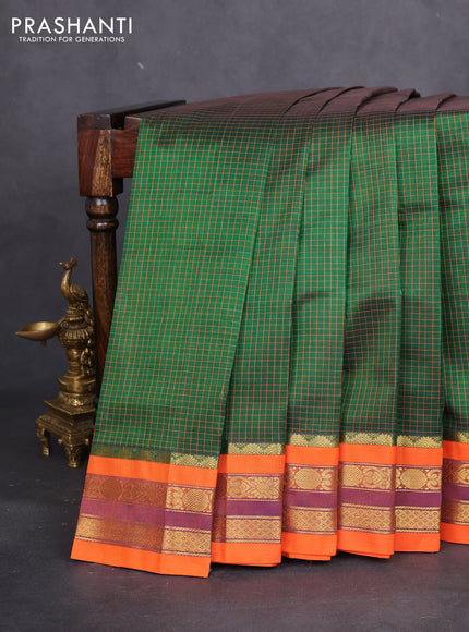 Silk cotton saree green and orange with allover thread checked pattern and zari woven korvai border