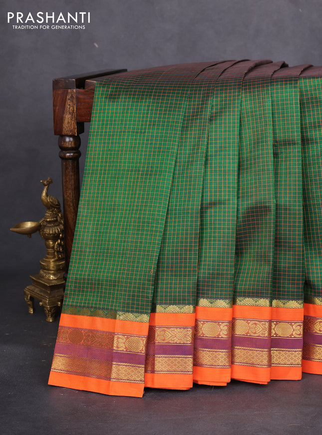 Silk cotton saree green and orange with allover thread checked pattern and zari woven korvai border