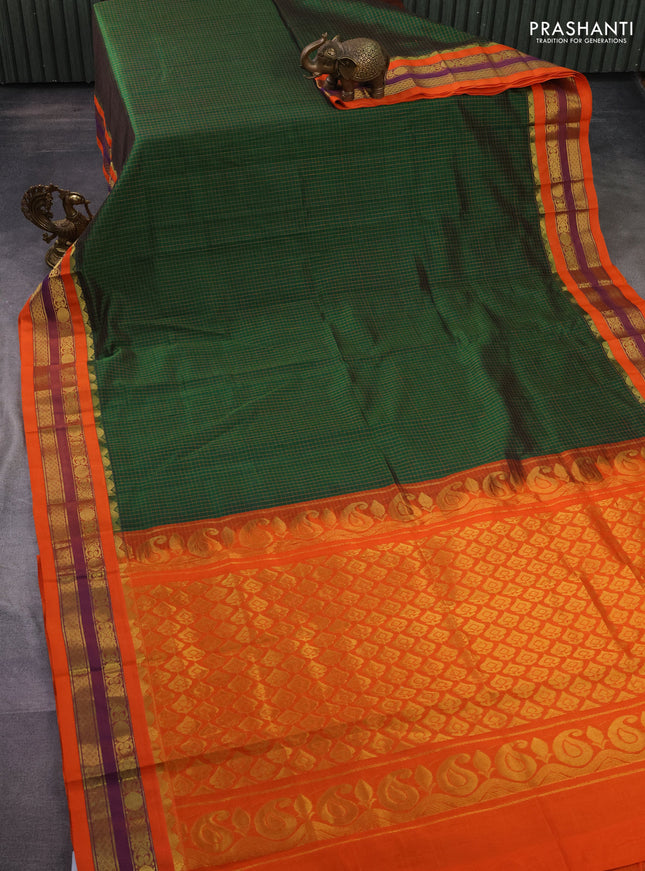 Silk cotton saree green and orange with allover thread checked pattern and zari woven korvai border