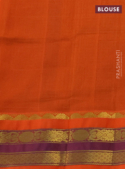 Silk cotton saree green and orange with allover thread checked pattern and zari woven korvai border