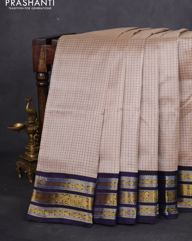 Silk cotton saree beifge and navy blue with allover thread checked pattern and zari woven korvai border