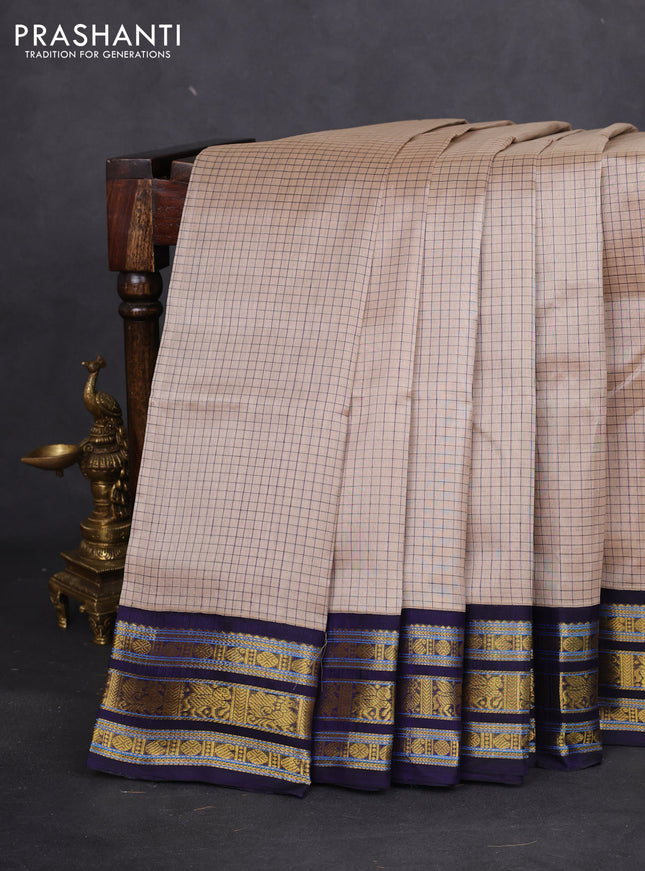 Silk cotton saree beifge and navy blue with allover thread checked pattern and zari woven korvai border