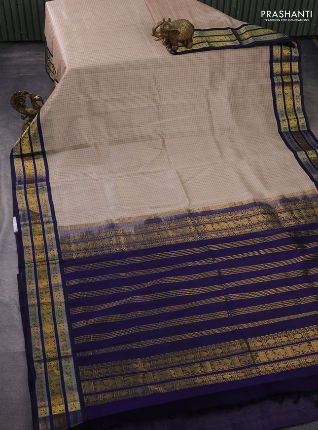Silk cotton saree beifge and navy blue with allover thread checked pattern and zari woven korvai border