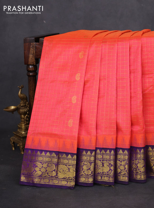 Silk cotton saree peach shade and purple with allover zari checks & buttas and temple design zari woven korvai border