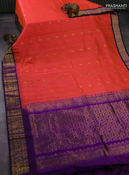 Silk cotton saree peach shade and purple with allover zari checks & buttas and temple design zari woven korvai border