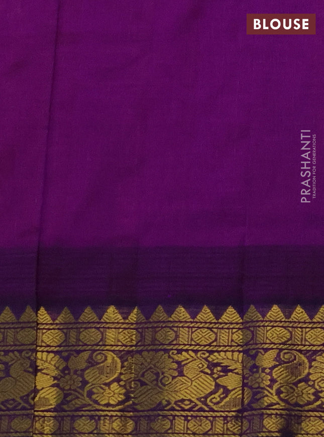 Silk cotton saree peach shade and purple with allover zari checks & buttas and temple design zari woven korvai border