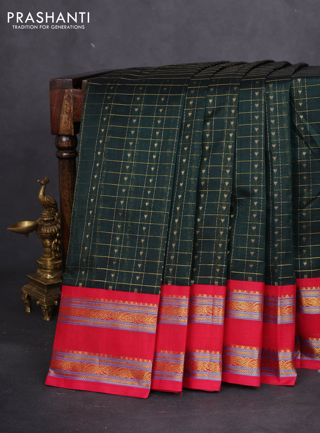 Silk cotton saree bottle green and red with allover zari checks & buttas and rettapet zari woven border