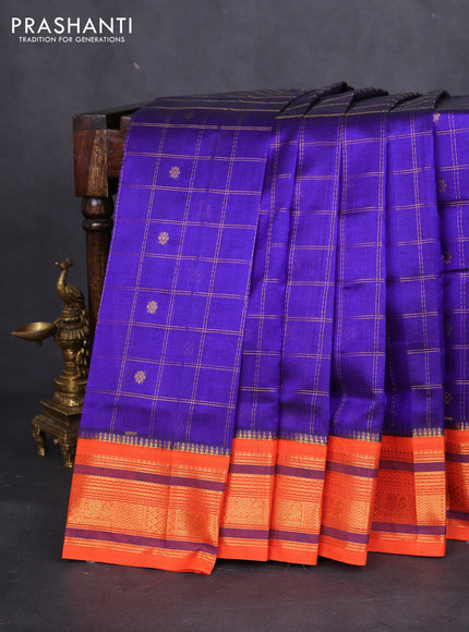 Silk cotton saree blue and orange with allover zari checks & buttas and zari woven korvai border
