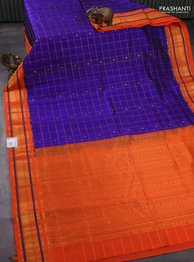Silk cotton saree blue and orange with allover zari checks & buttas and zari woven korvai border
