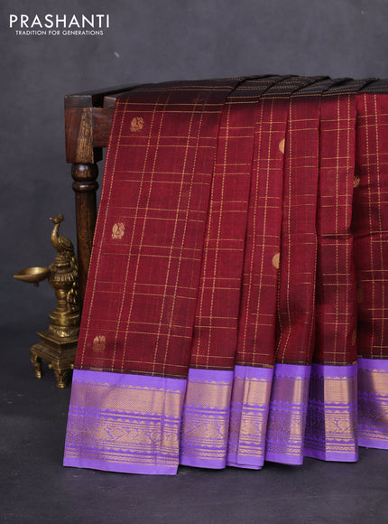 Silk cotton saree maroon and lavender with allover zari checks & buttas and zari woven korvai border