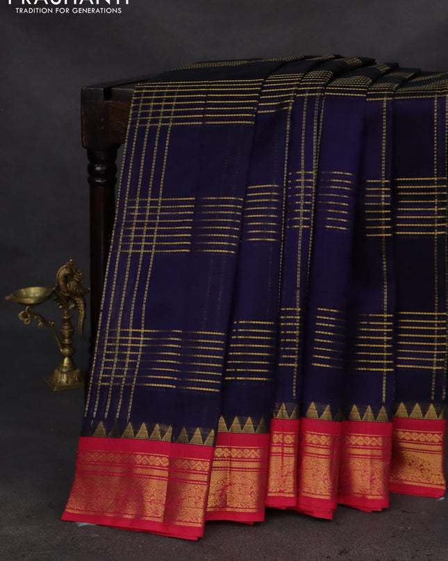 Silk cotton saree dark blue and pink with allover zari checked pattern and zari woven korvai border
