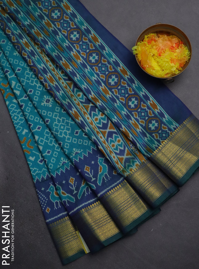 Semi tussar saree teal blue and dual shade of blue with allover ikat prints and zari woven border