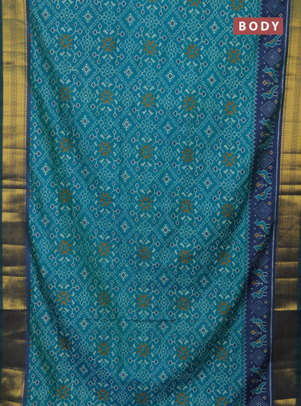 Semi tussar saree teal blue and dual shade of blue with allover ikat prints and zari woven border