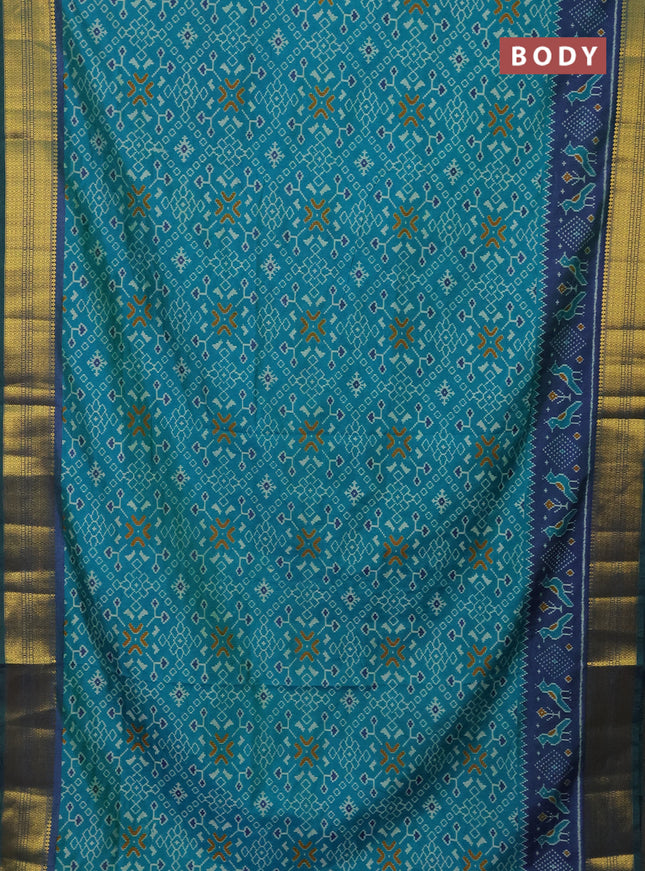 Semi tussar saree teal blue and dual shade of blue with allover ikat prints and zari woven border