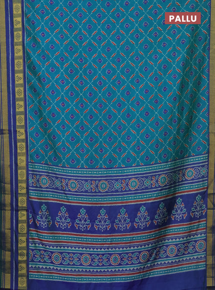 Semi tussar saree teal blue and blue with allover ikat prints and zari woven border