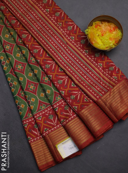 Semi tussar saree green and rust shade with allover ikat prints and zari woven border