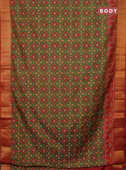Semi tussar saree green and rust shade with allover ikat prints and zari woven border