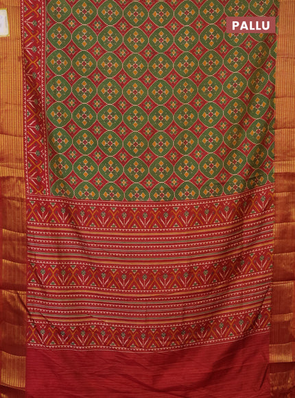 Semi tussar saree green and rust shade with allover ikat prints and zari woven border