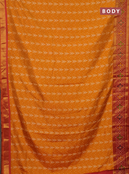 Semi tussar saree mustard yellow and rust shade with allover ikat prints and zari woven ikat border