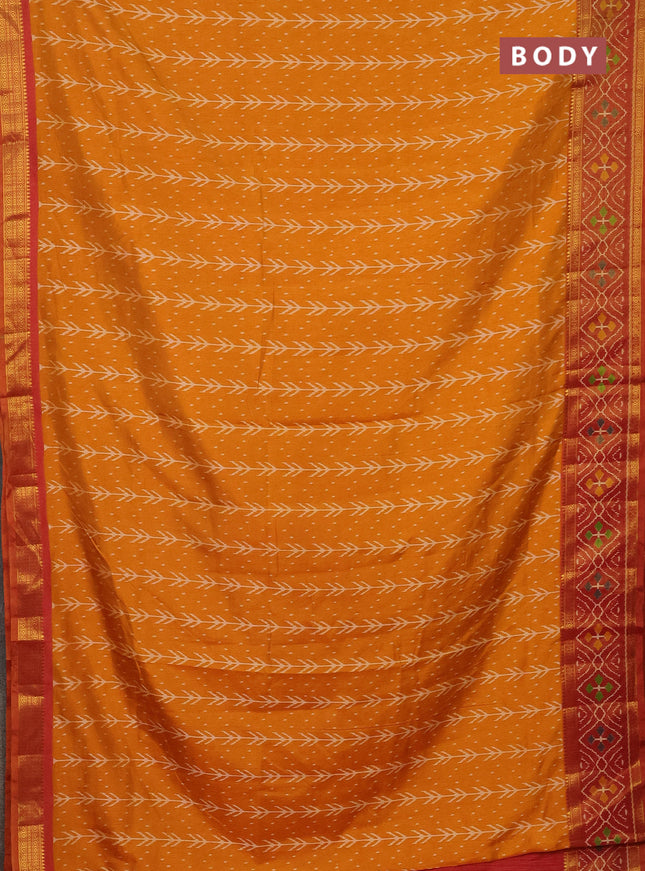 Semi tussar saree mustard yellow and rust shade with allover ikat prints and zari woven ikat border
