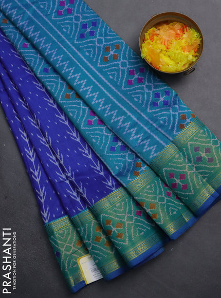 Semi tussar saree blue and teal green with allover ikat prints and zari woven ikat border